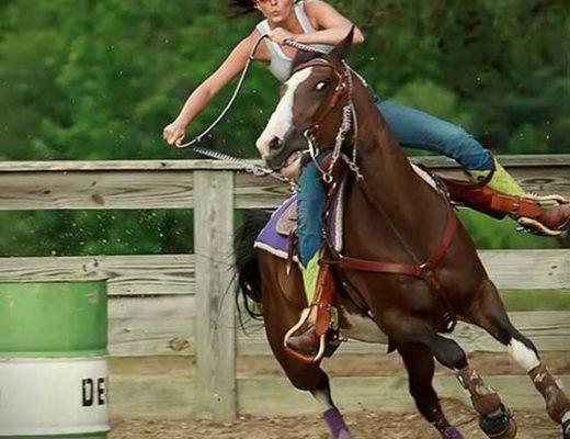 Hard kicking and pulling on a severe curb, this barrel horse runs wild-eyed and it would be hard for anyone unbiased to think the horse enjoyed the sport.